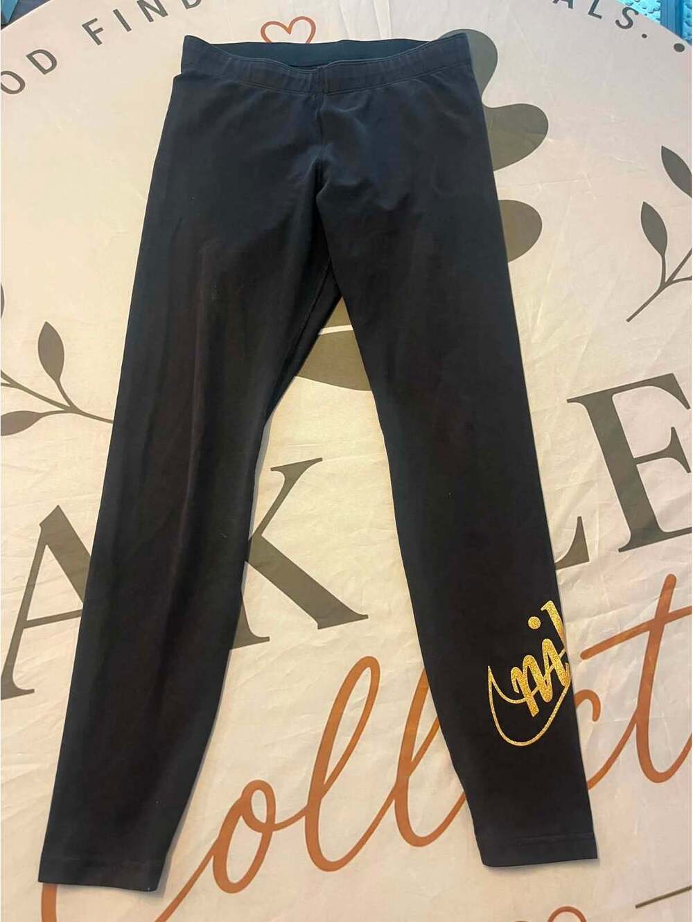 Nike Black Leggings with Gold Logo - Size Medium